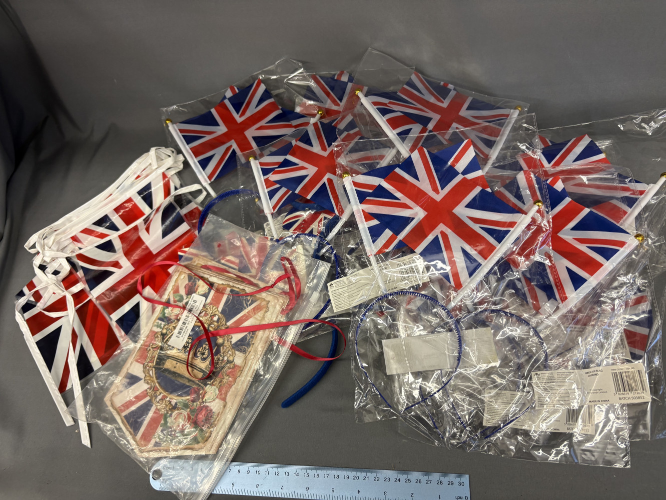 2 lots of bunting and approx 15 headbands with union Jacks on