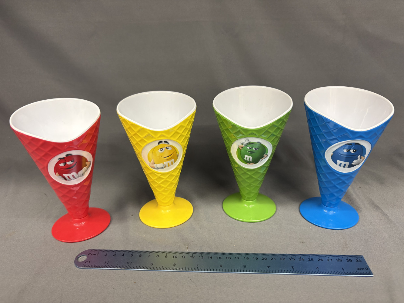 Four Collectable M&M plastic cones