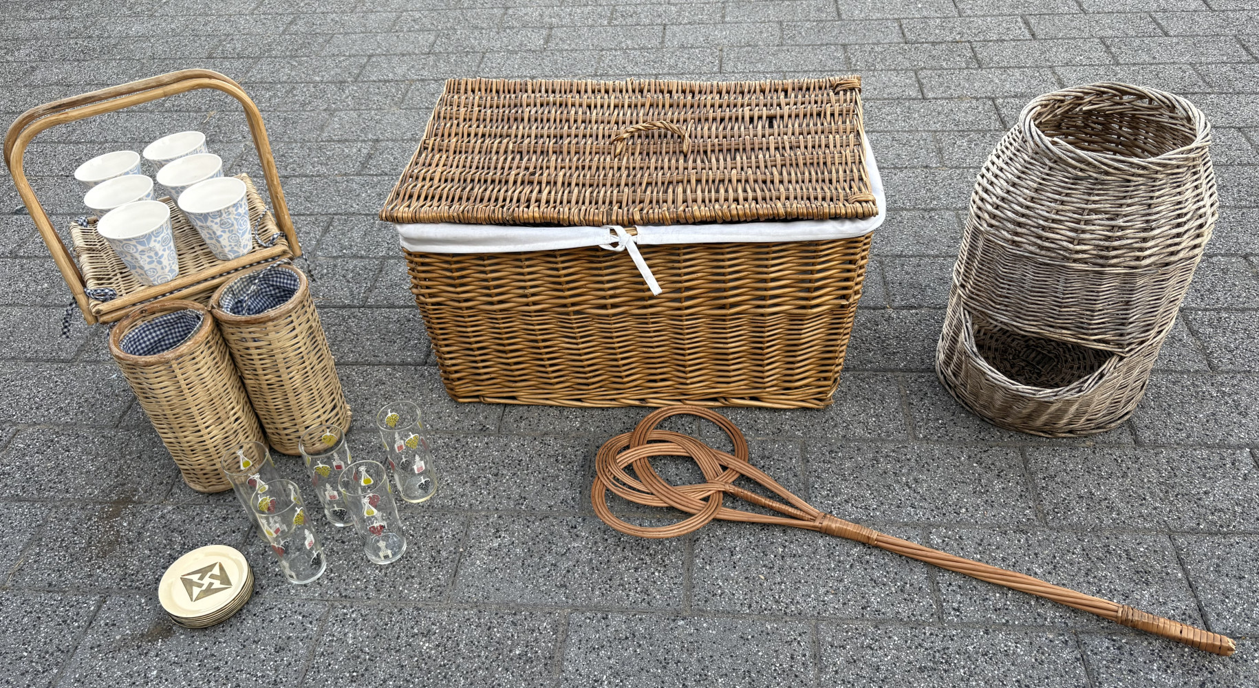 a large, rectangular double-steamed wicker storage chest, rug beater, picnic hamper add antique brown willow potato storage hopper