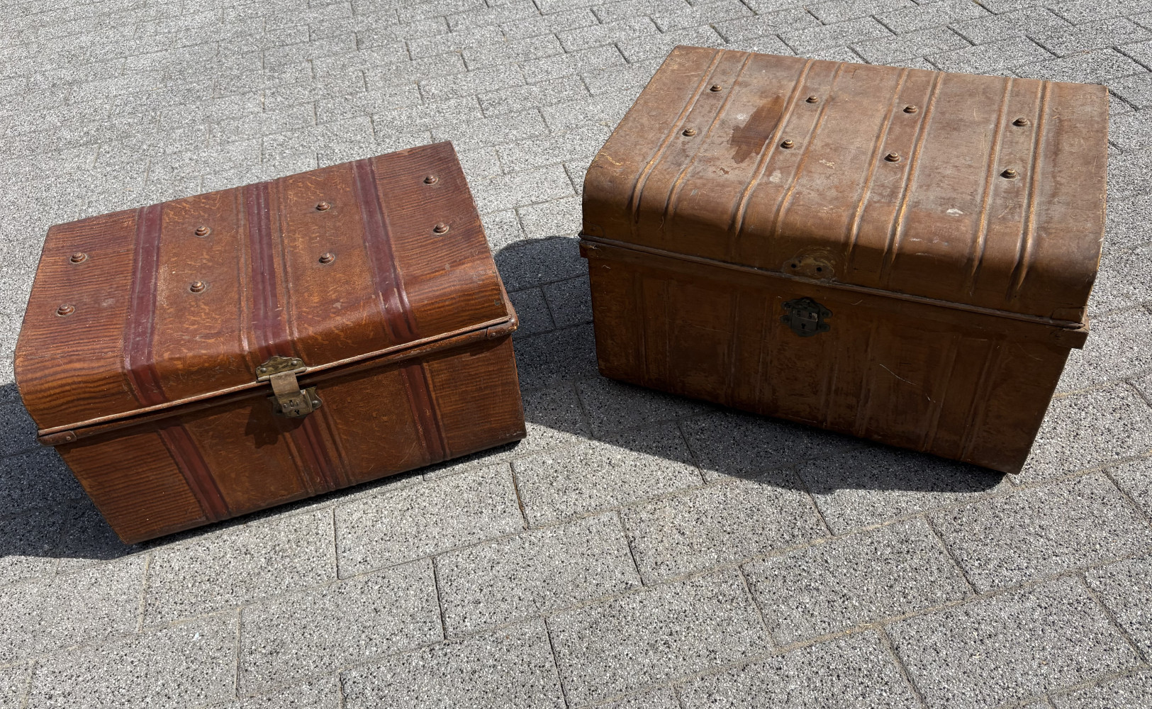 Two large painted wooden effect metal trunks