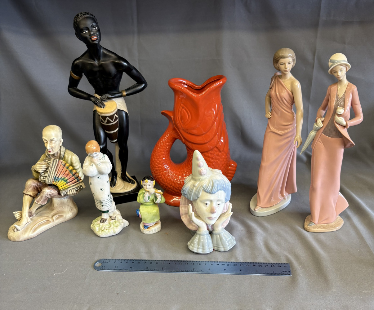 Two NAO 12 inch figures, large Glug jug, large African figure and other Japanese style figures