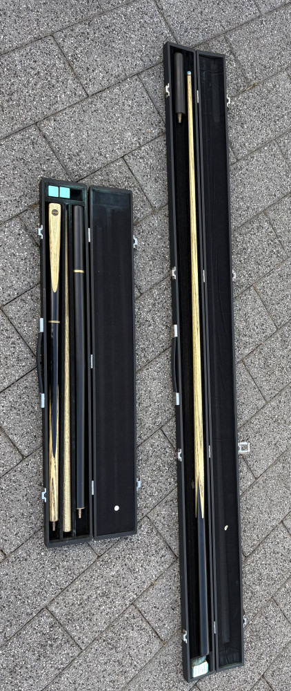 Two snooker cues both in mint condition in hard cases