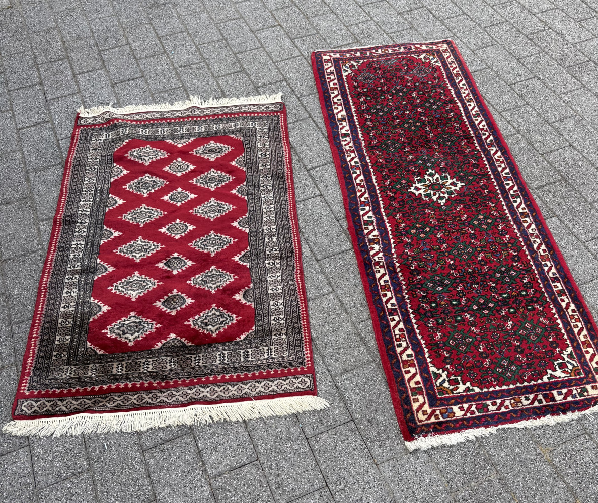 Two rugs one 2 meters long the other 1.5 meters long