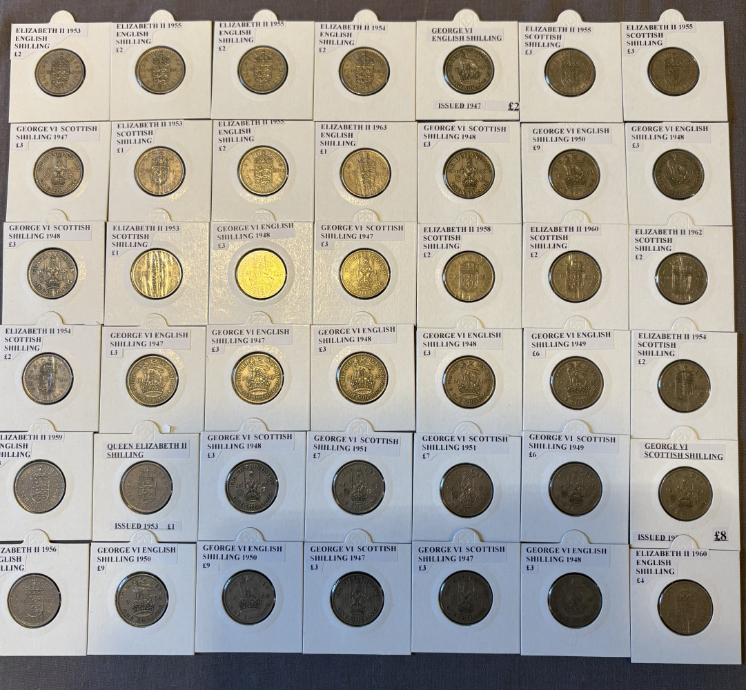 42 cased English and Scottish Shillings dealers value on this was £142