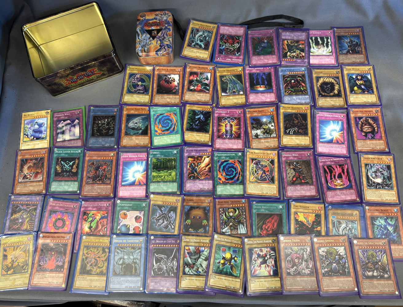 Yu-Gi-Oh cased collectors cards with tin and pin badge