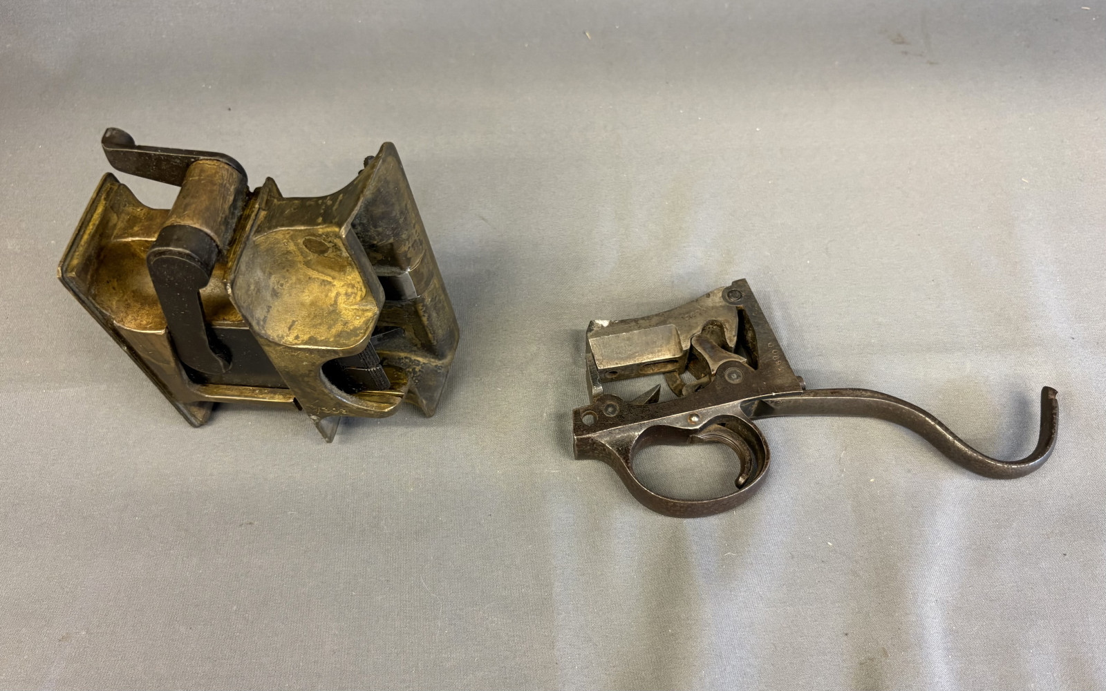 Vickers Machine Gun Brass Feed Block Assembly And Late Victorian Martini-Henry / Martini-pattern long-lever trigger guard & lockwork assembly, c. 1880s.