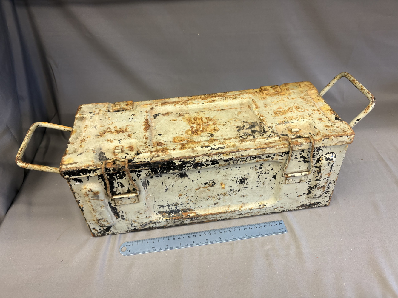 WW2 ammunition box dated 1945 full of brass and metal shell casings