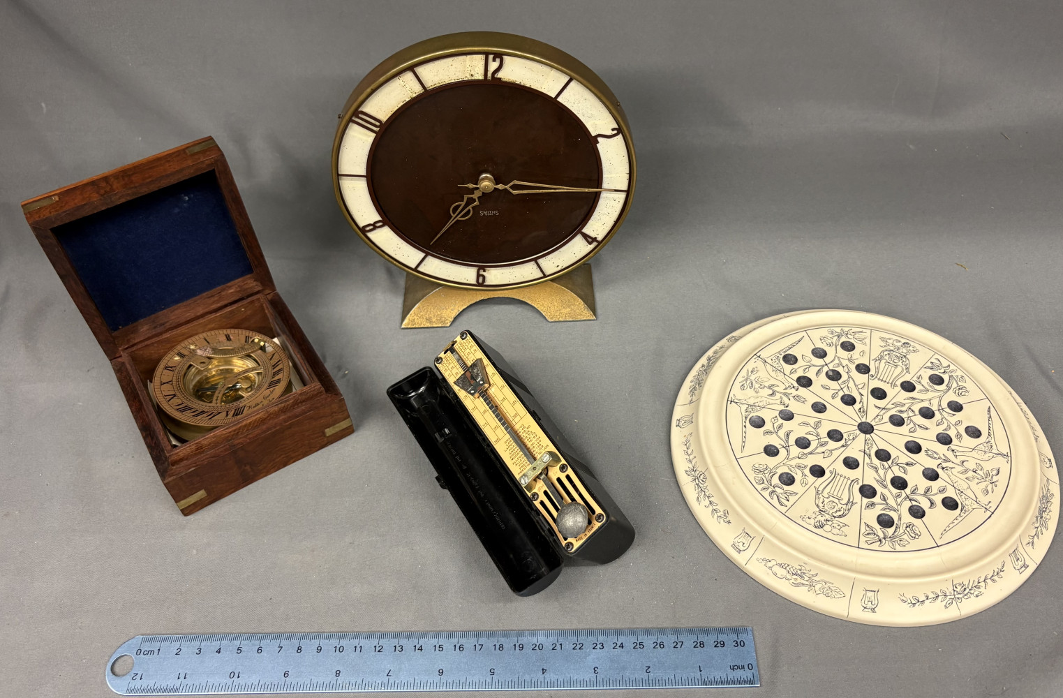 Boating compass in a box, solitare board, beautiful vintage smiths clock and wind up metronome