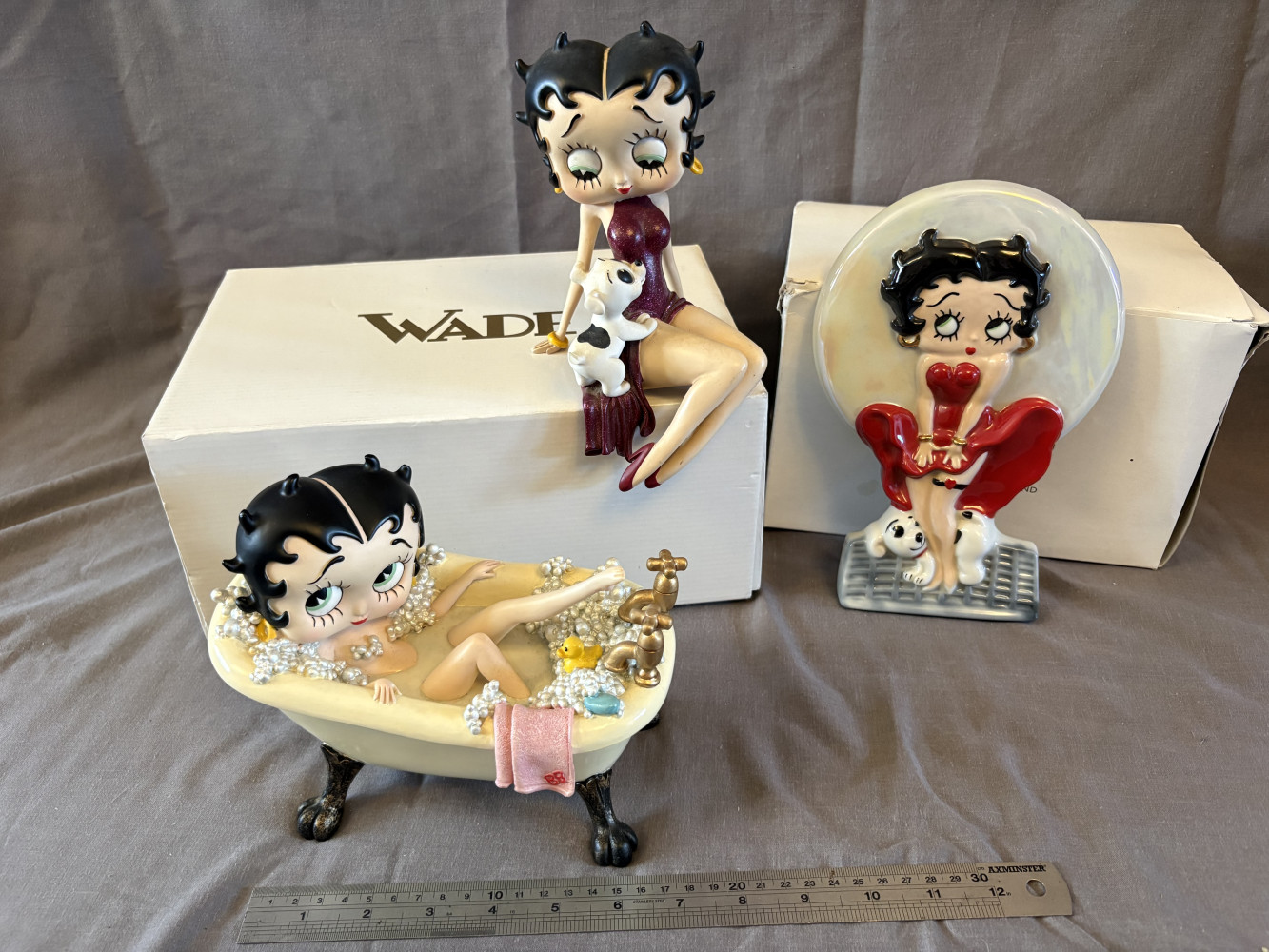 Vintage Betty Boop with Pudgy shelf sitter figurine Approx 20cms,  1997 limited-edition Wade Ceramics Betty Boop wall plaque and a Betty Boop collectible figurine from 2003 of her relaxing in a clawfoot bathtub