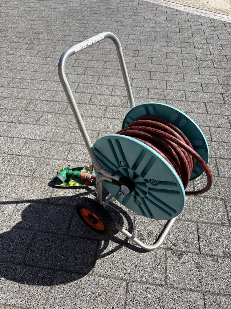 Hose reel with attachment