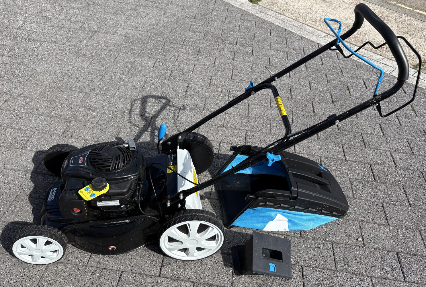 Mac Allister petrol lawnmower powered by a Briggs & Stratton 500E series 140cc engine £200 new this one has never been used