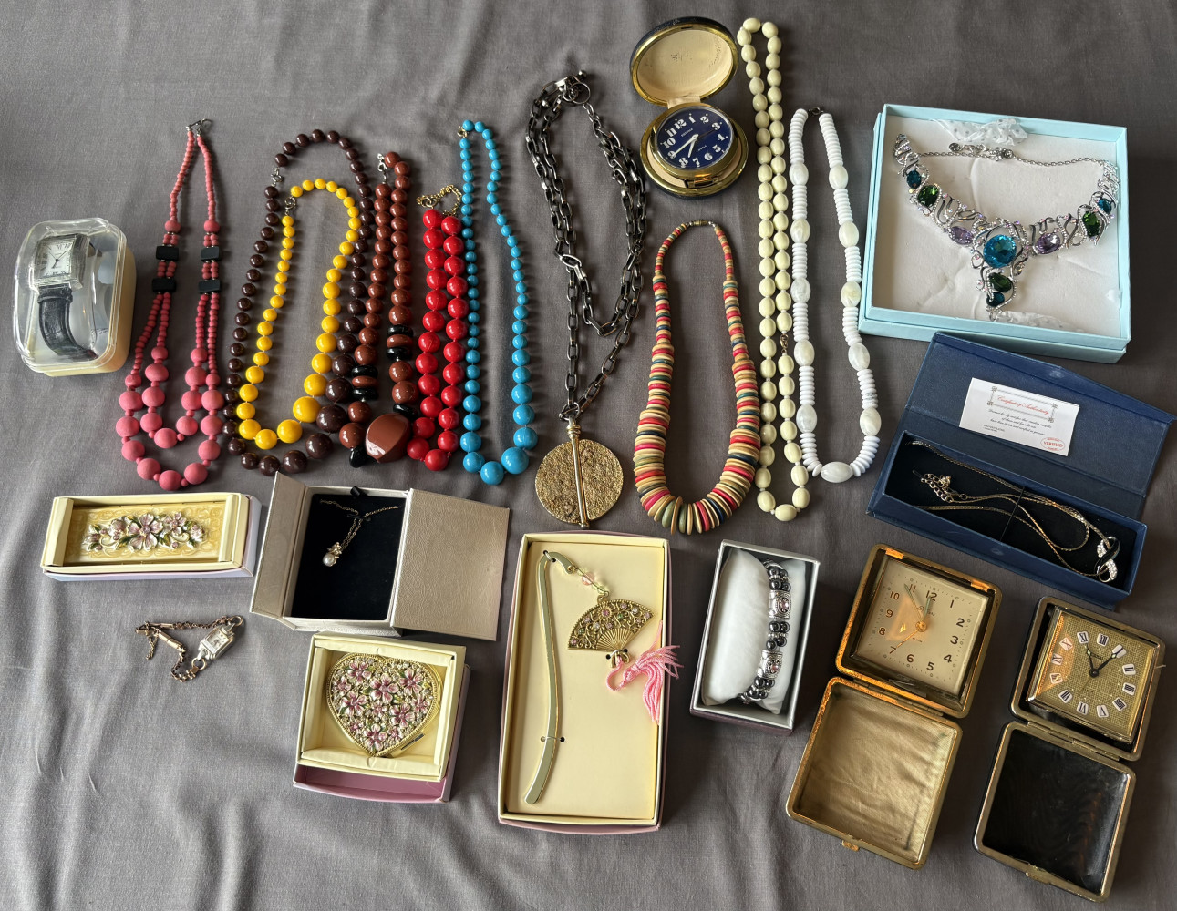 Large lot of mixed jewellery items and travel clocks