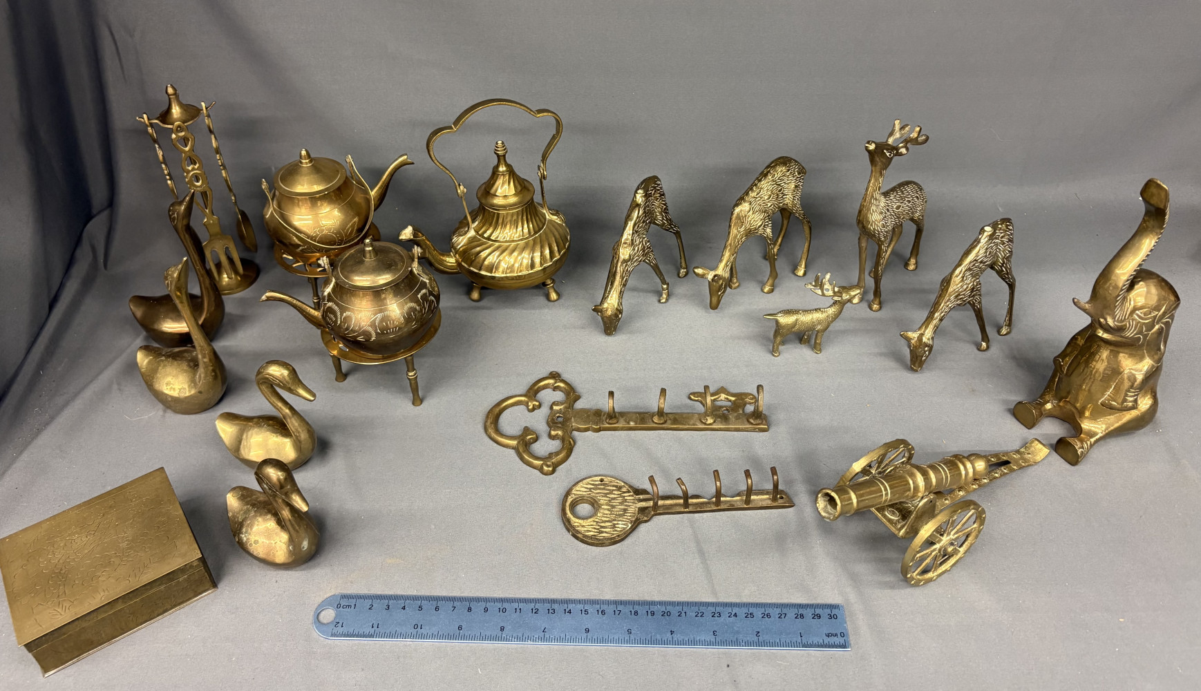 Collection of quality brass, including set of deer, cannon, hooks, pots and other items