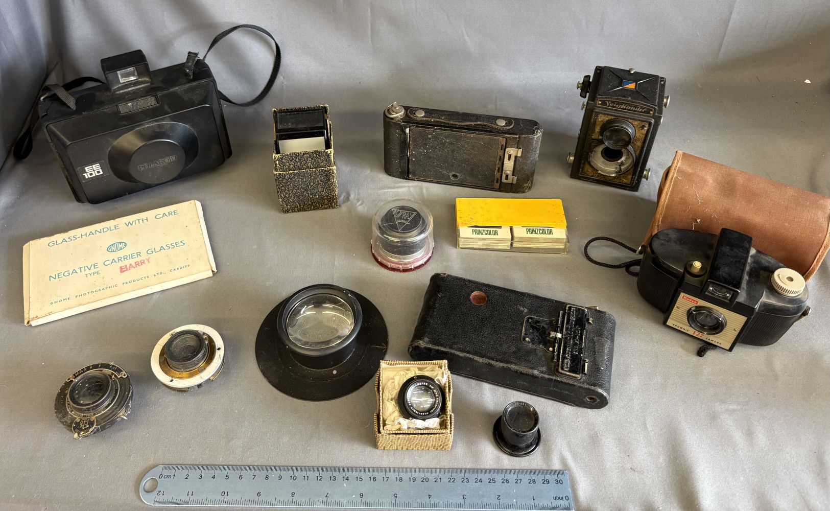 Mixed lot of Antique and vintage cameras and lenses