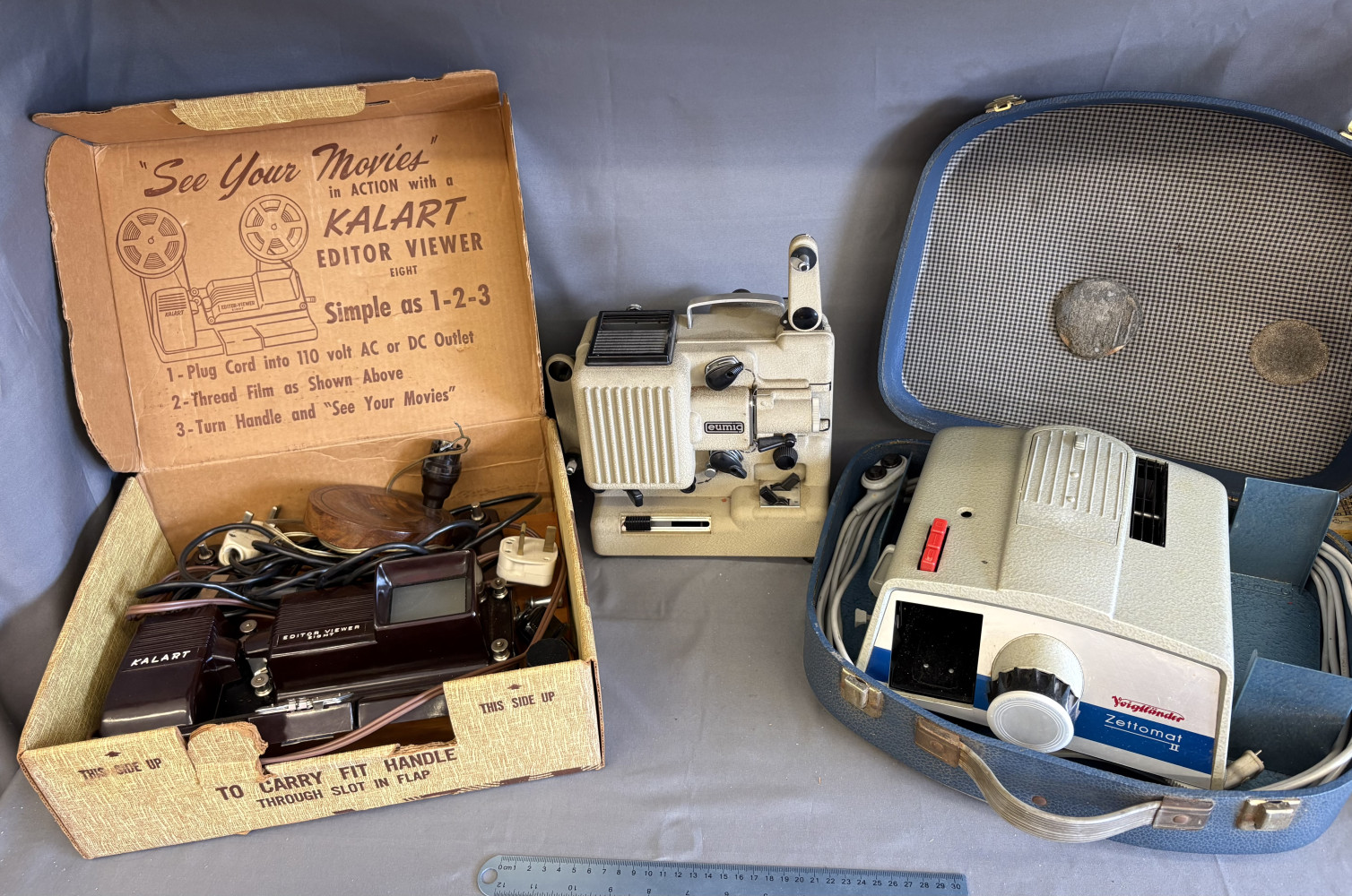 Vintage boxed Kalart Editor Viewer Eight (Model EV-8) 8mm film editor and viewer, vintage Eumig Wien Type P8 8mm film projector and a vintage Voigtländer Zettomat II 35mm slide projector