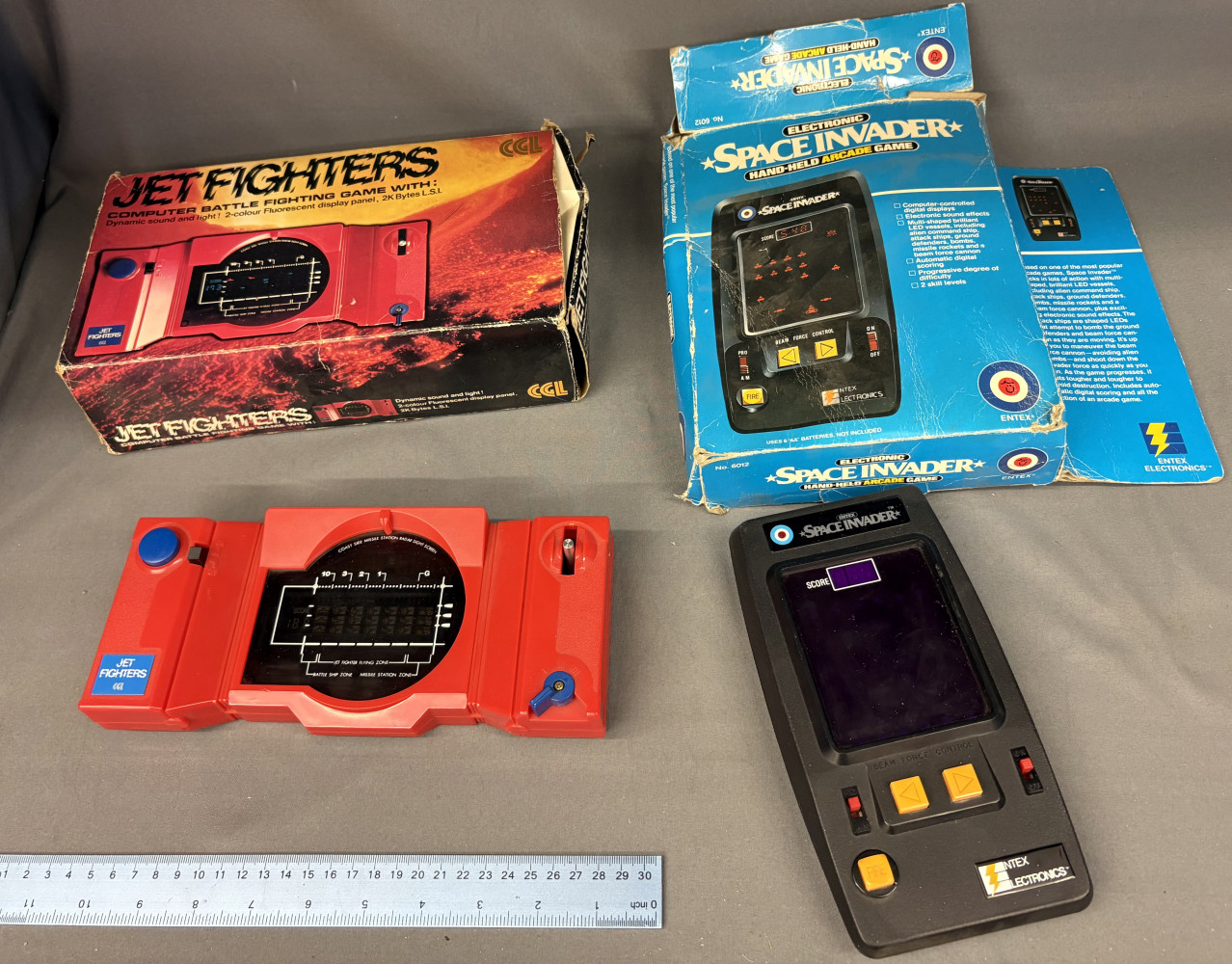 1980s vintage CGL Jet Fighters tabletop electronic game and vintage Entex Electronic Space Invader hand-held arcade game