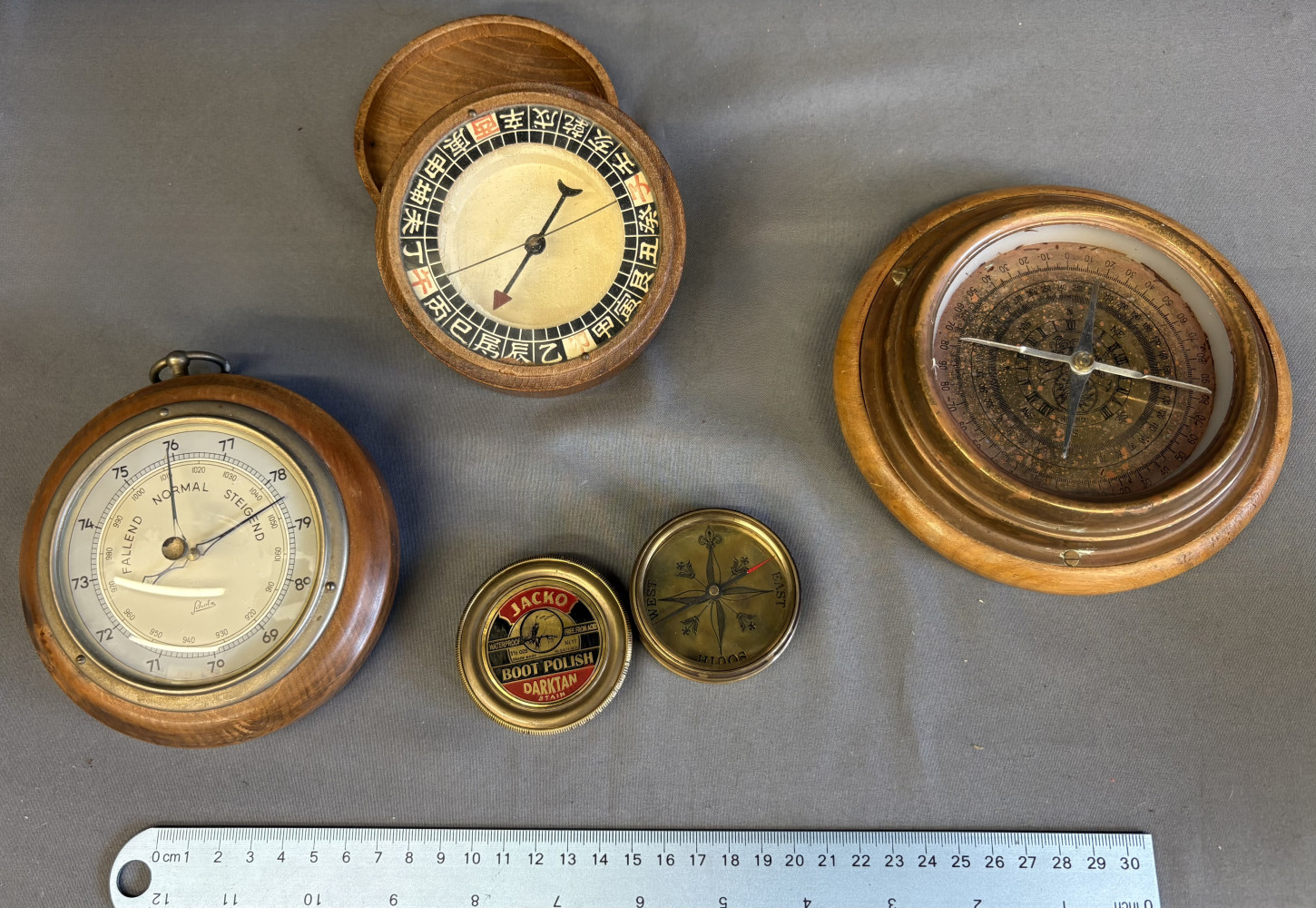 3 Compasses and a hanging Barometer