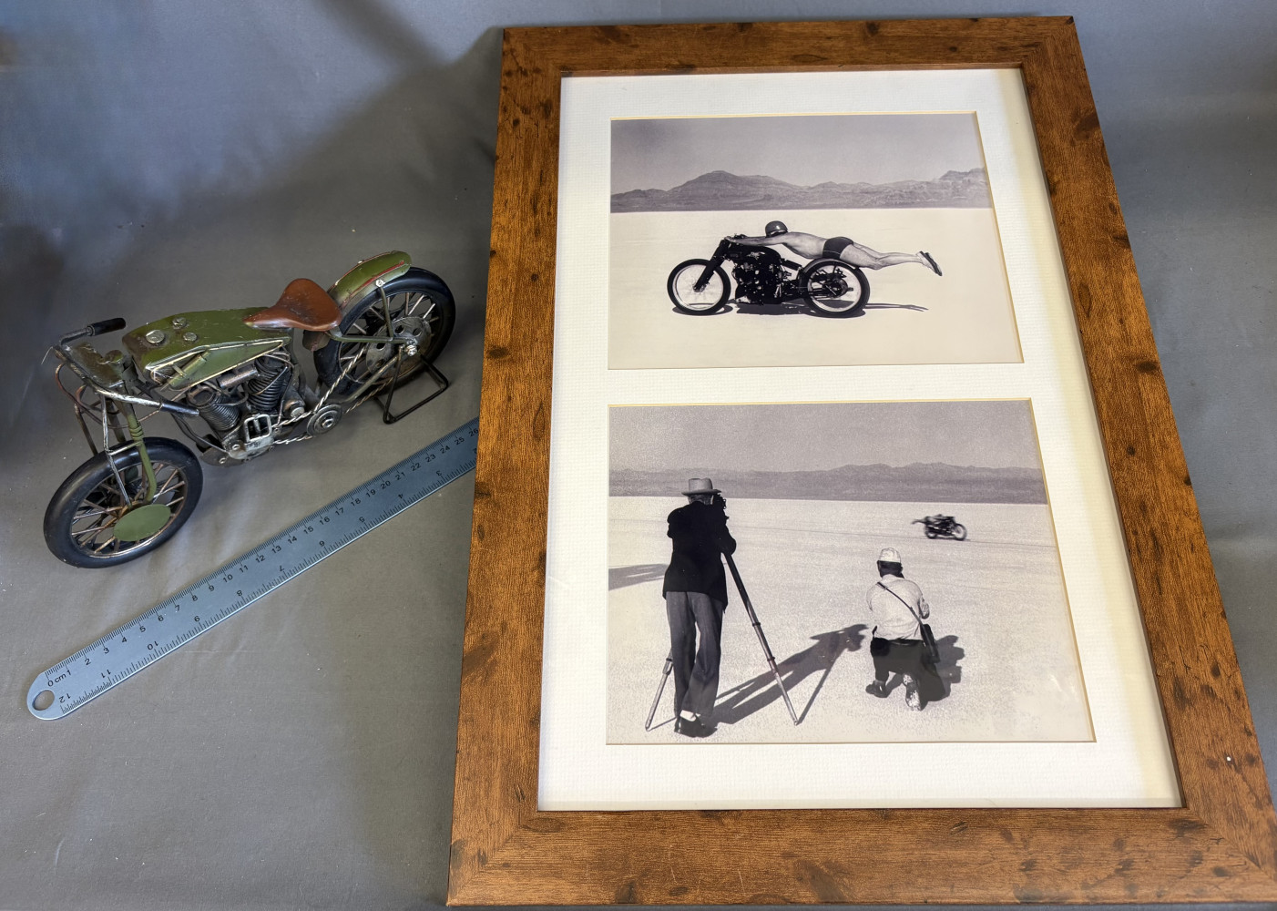 Framed landspeed pictures and Tin motorbike