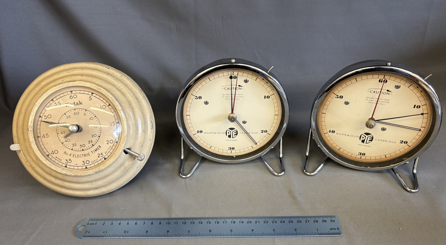 2 A W.G PYE & CO LTD Bakelite and chrome laboratory clock, 16 x 17cm and a Rare Vintage Kodak No. 4 electric darkroom timer