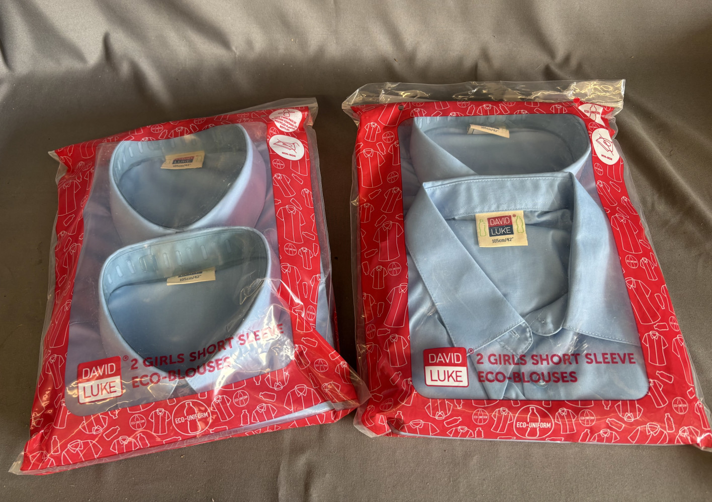 2 packs of unused school shirts