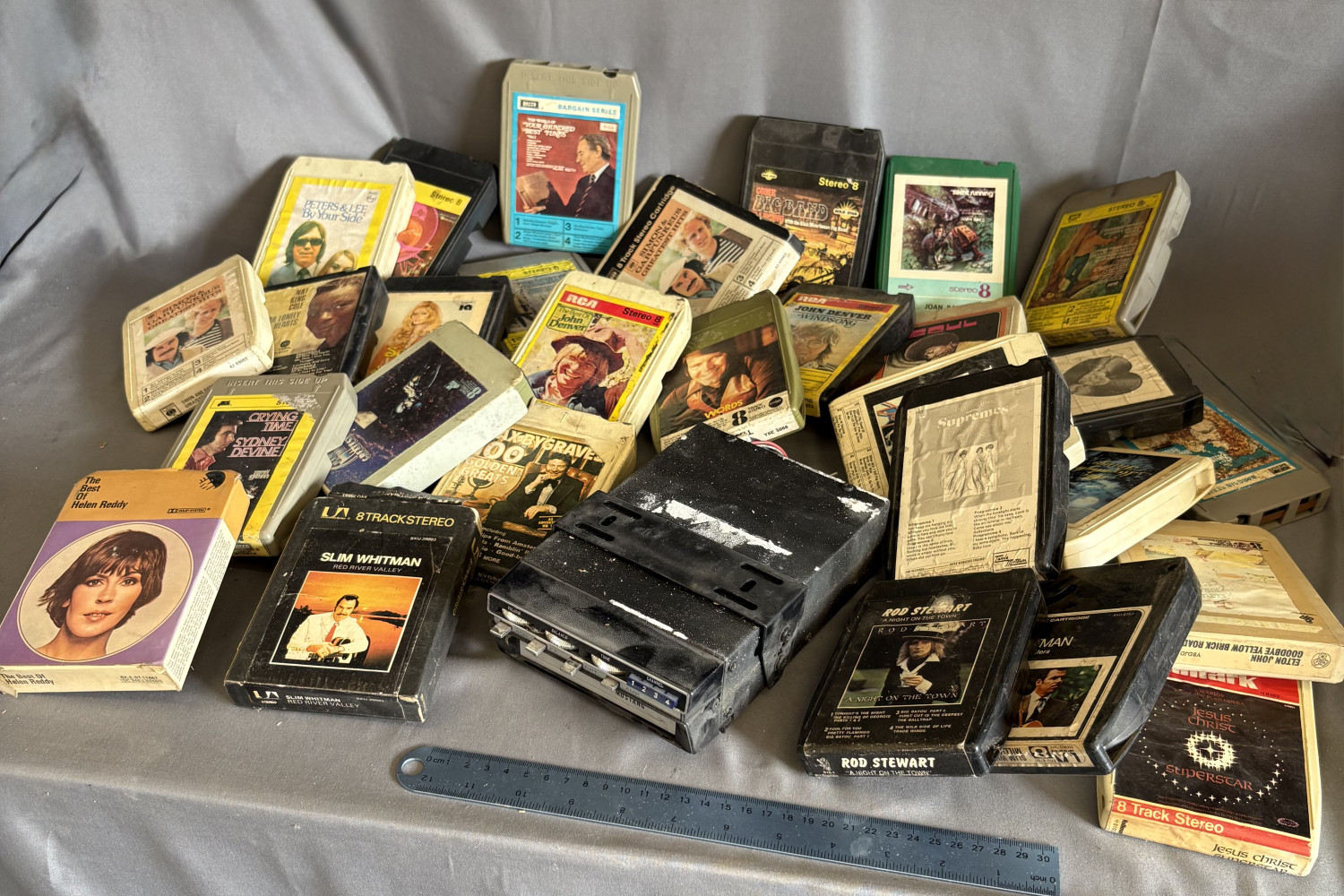 Mustang 8 track player and 29 8 track tapes