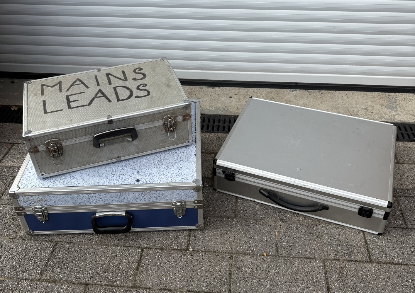 3 Flight boxes large, Silver flight box 62 x 47 cms and the Blue one 61 x 52 small silver one hinge damaged on back