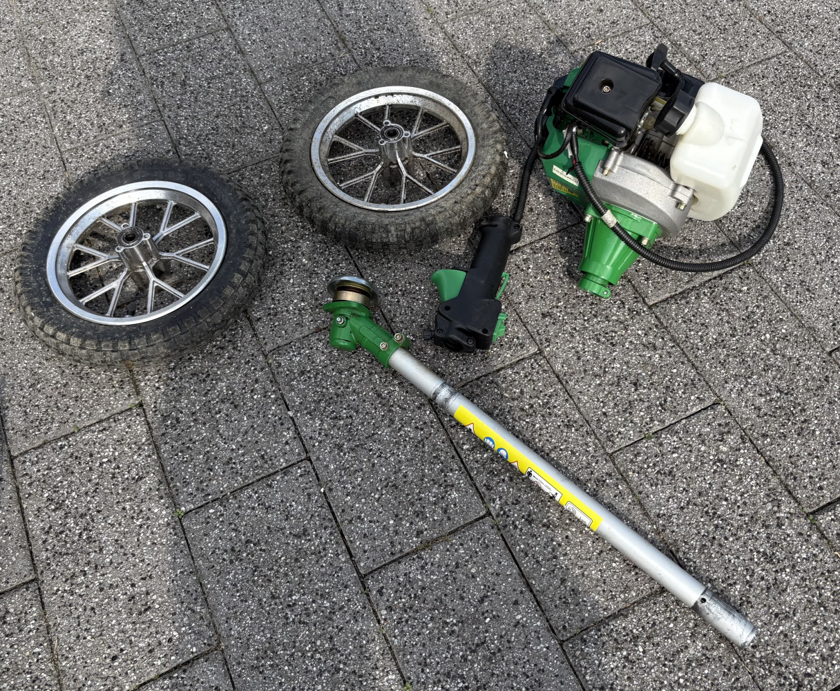 Unused petrol motor, set of of wheels and shaft, use for fun conversion of something