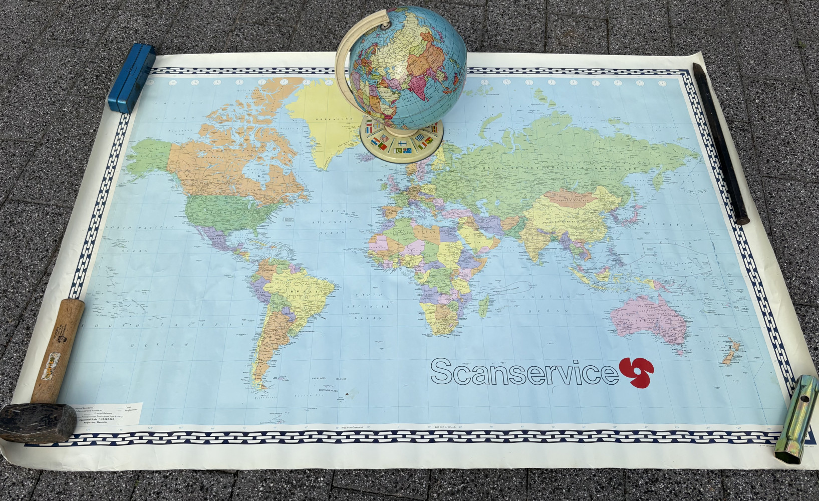 Large map and vintage tin globe