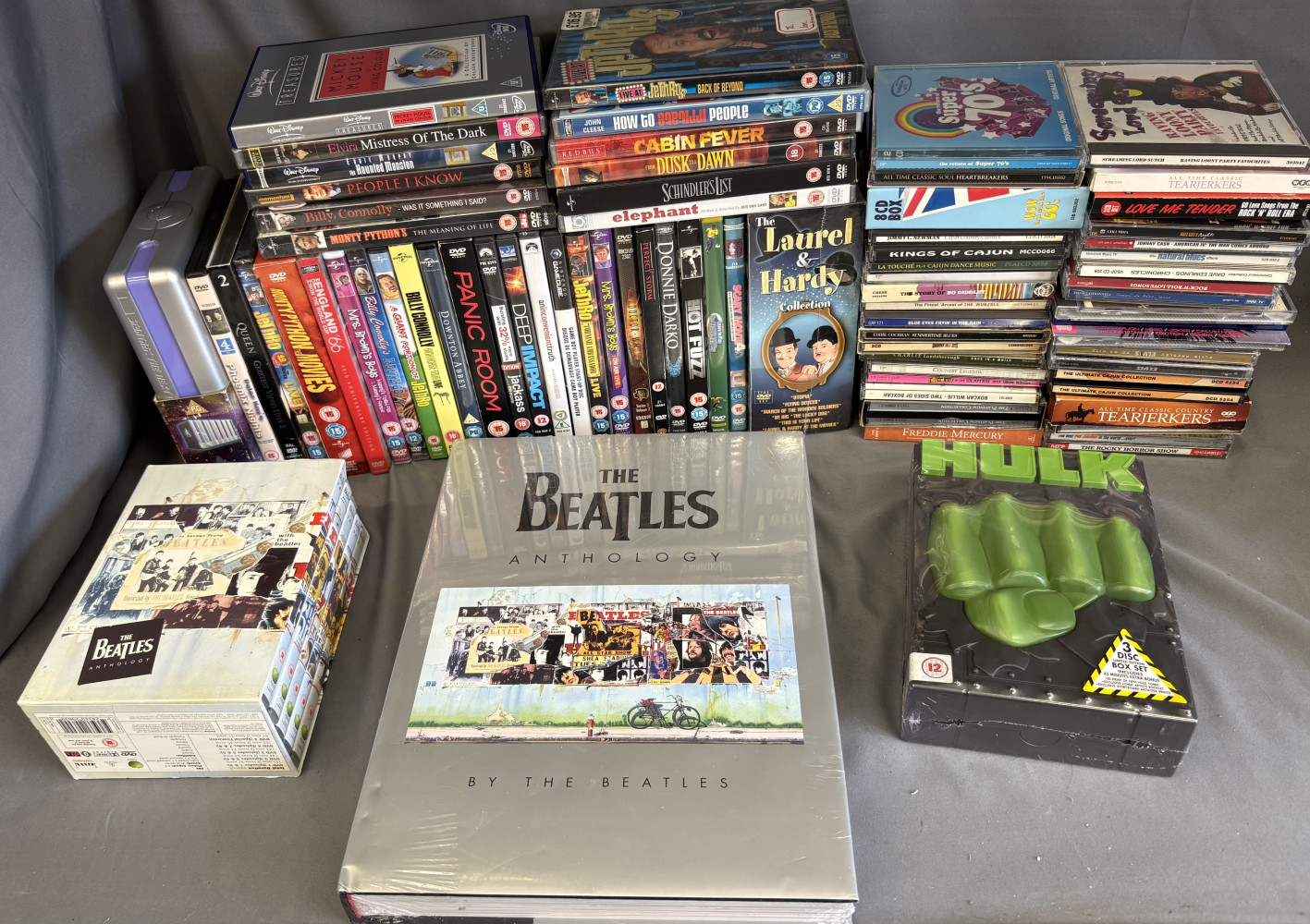 The Beatles Anthology hardback book, and large amount of DVDs and CDs