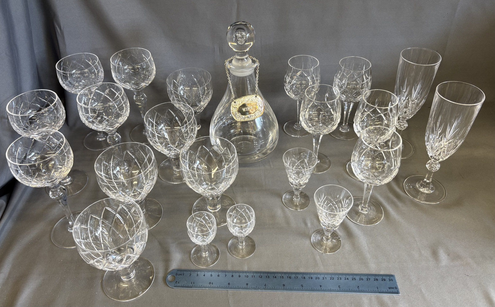 Decanter with label, and various sets of crystal and cut glass glasses perfect for Christmas entertaining