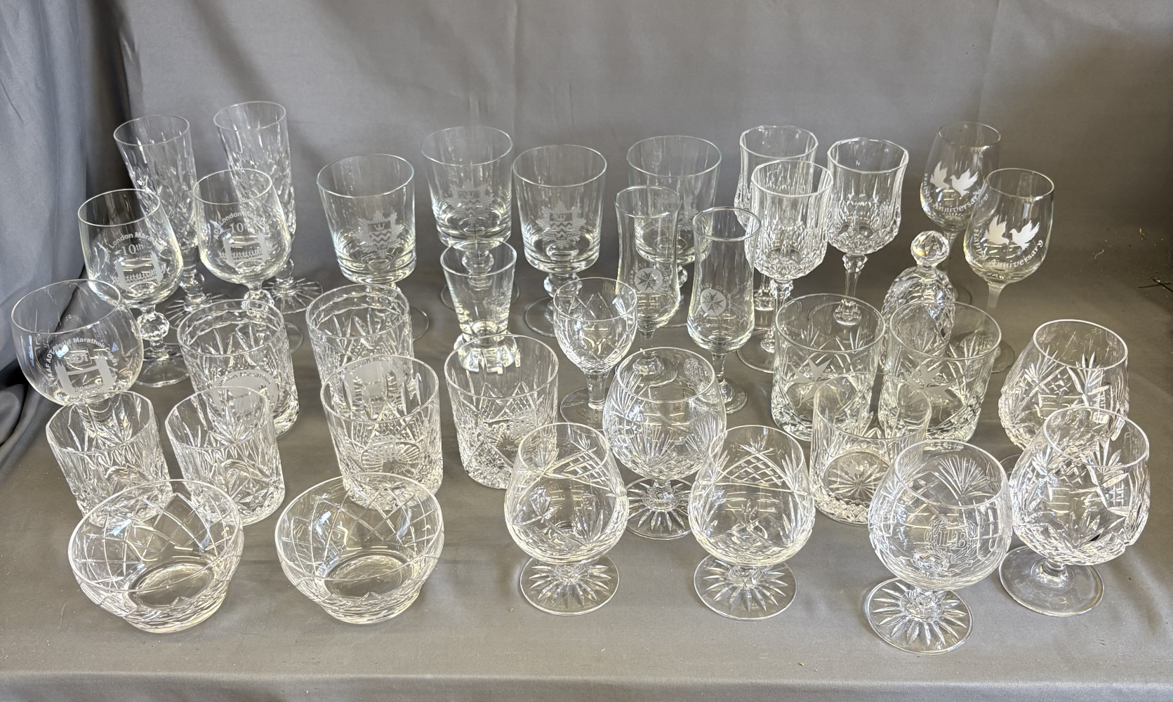 Large lot of Etched Commemorative Crystal and normal glasses, from London Fire Brigade, Marathon and St John’s Ambulance