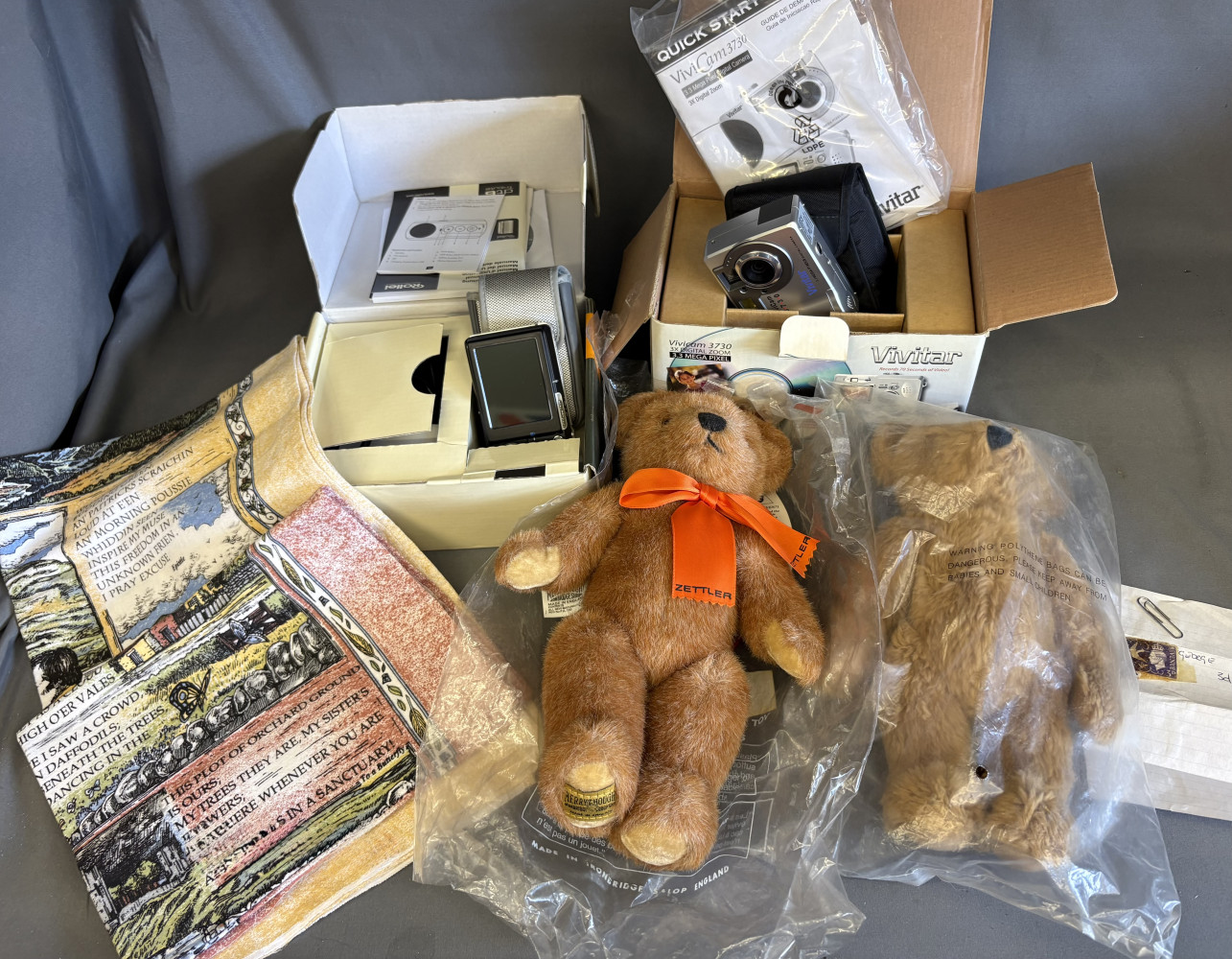 2 digital cameras, collectible Merrythought teddy bear, stamp, commemorative tea towels and other vintage teddy bear