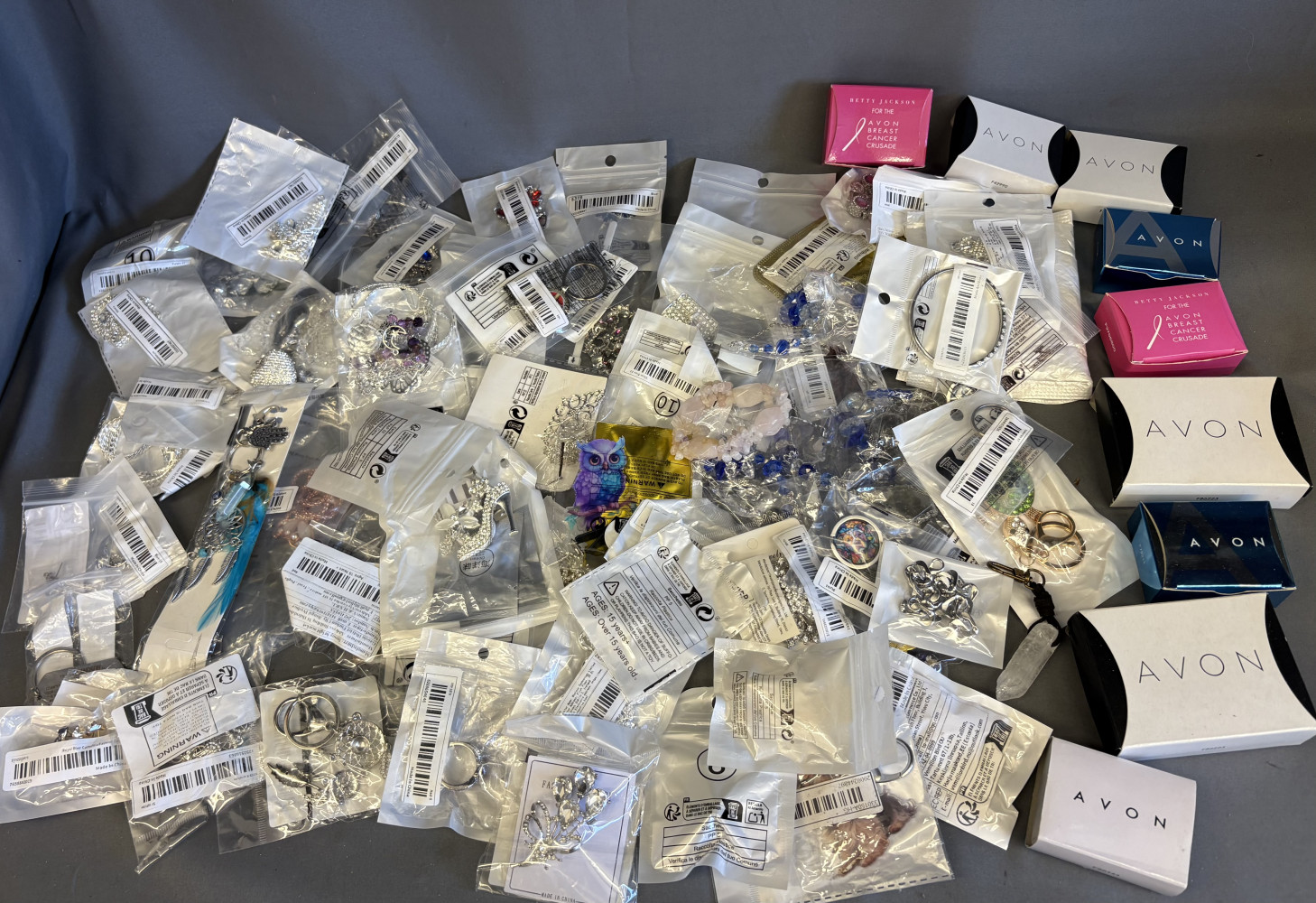 Large new job lot of Avon and other fashion jewellery