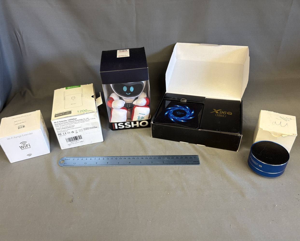 Collectable boxed Toyota Issho Promotional Plush Toy, an X96Q Max Android TV Box and other WiFi and speakers accessories
