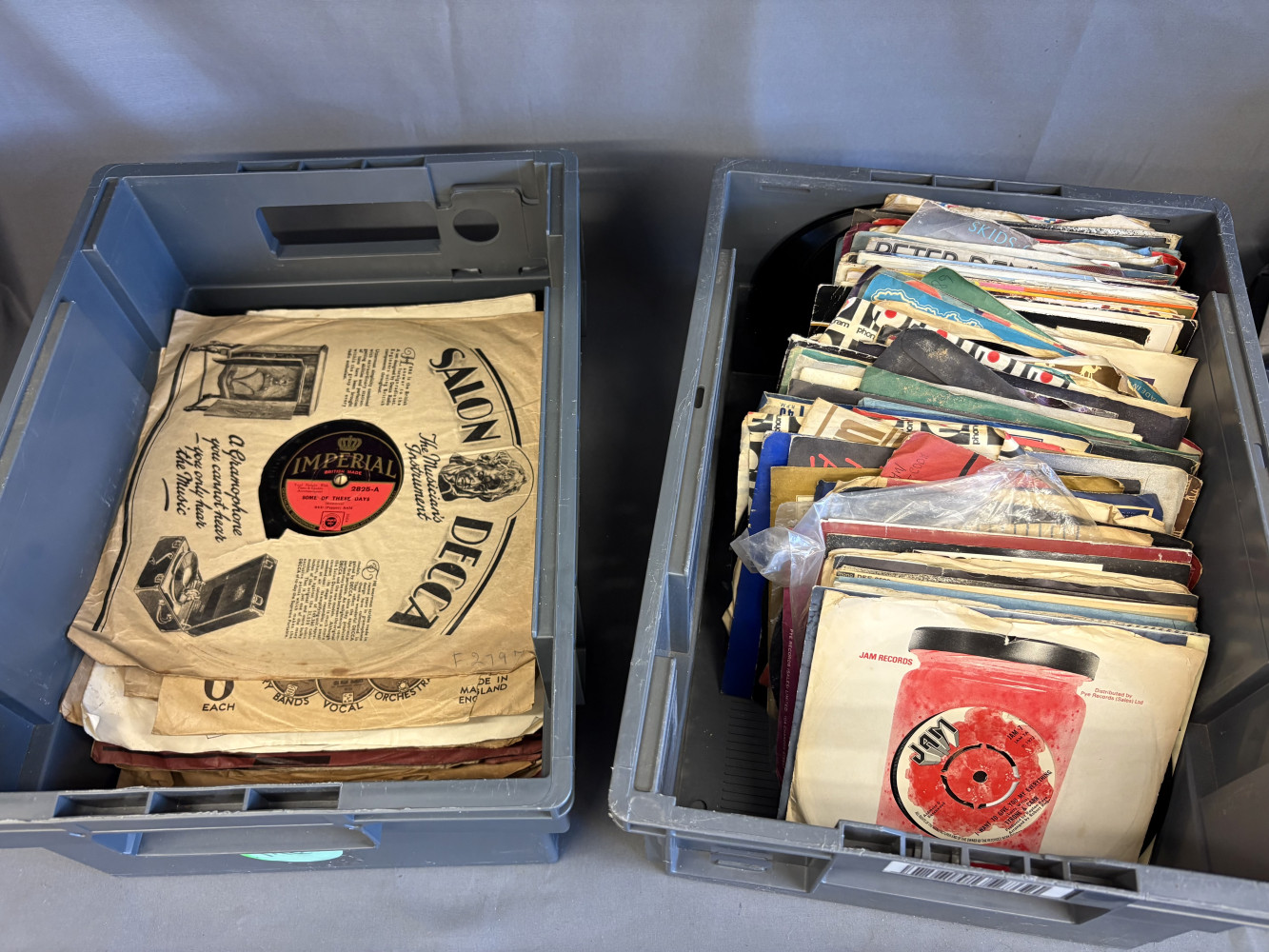 Box of 7 inch records and other box of vintage 10-inch shellac records