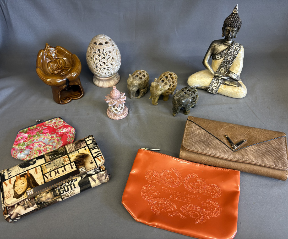 Buddha, candle holder, elephant figures and mixed purses