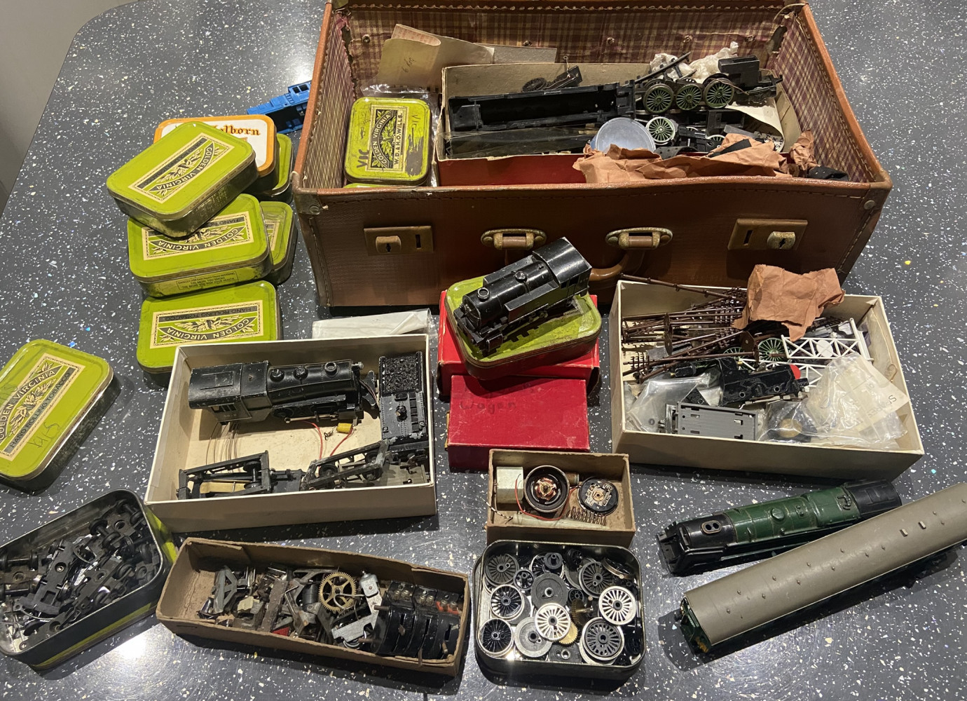 Suitcase full of vintage Tri ang and Hornby trains and accessories