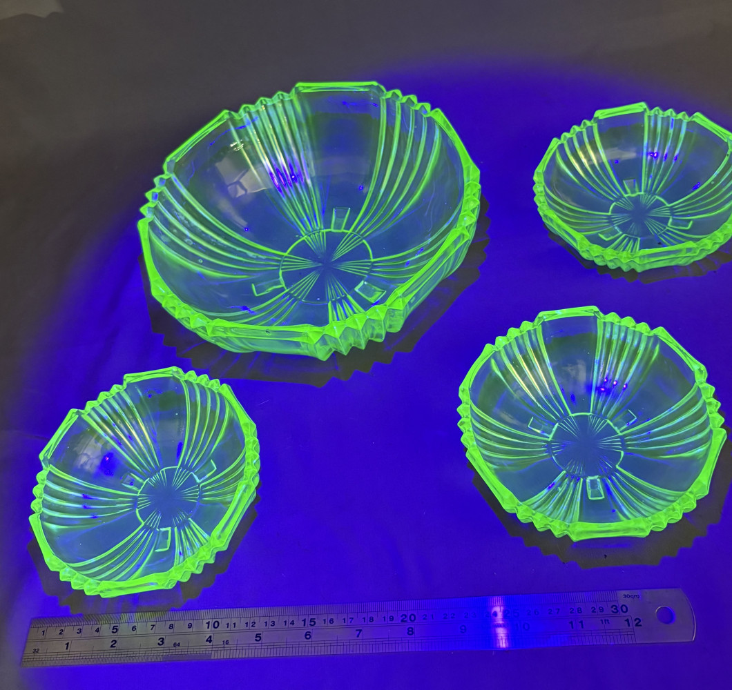 Four vintage Art Deco green uranium glass bowls