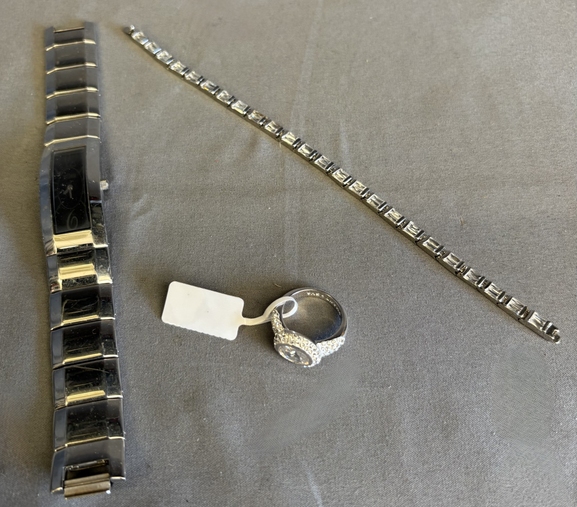 Storm wristwatch , bracket and metal ring