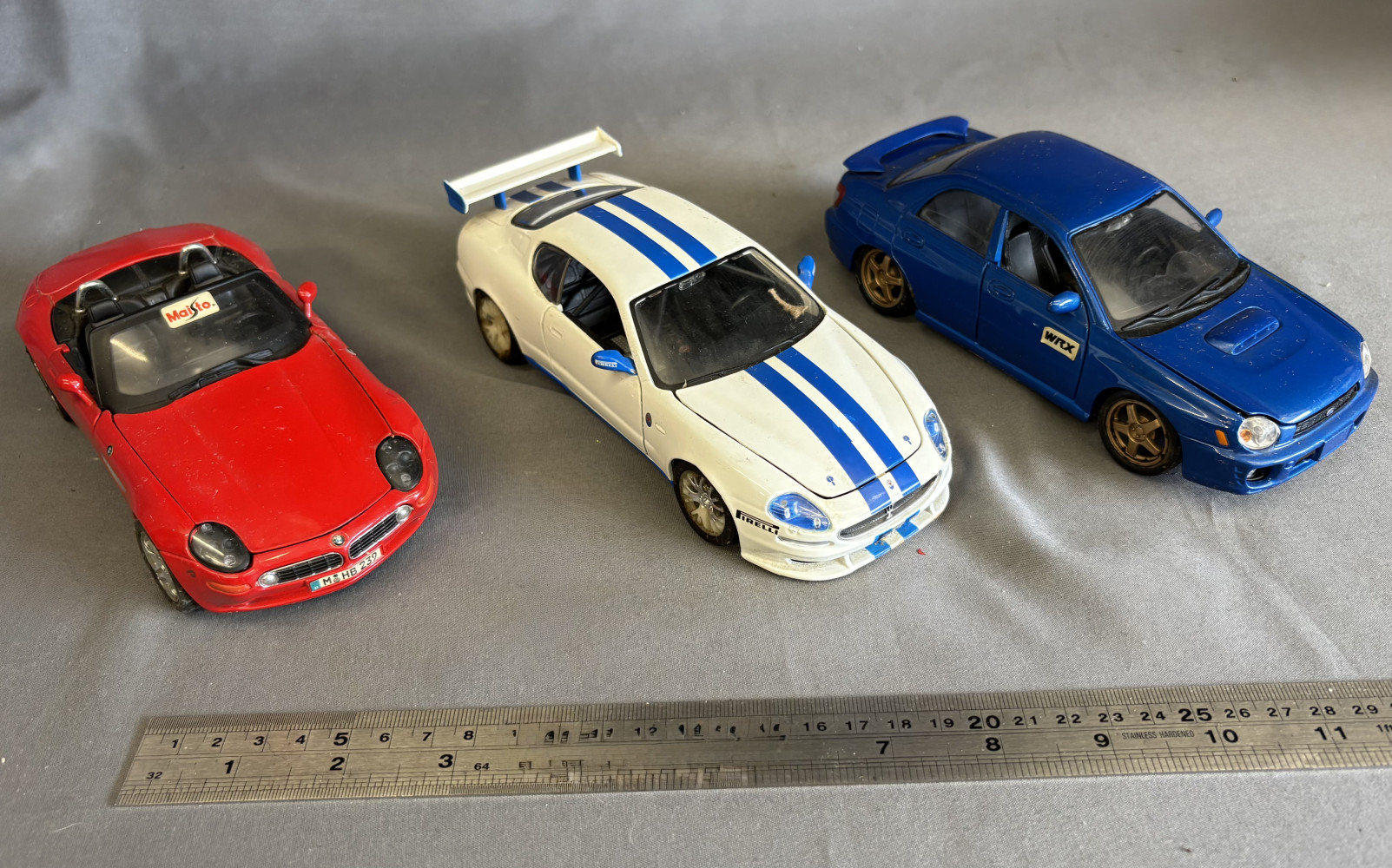 Three diecast model cars