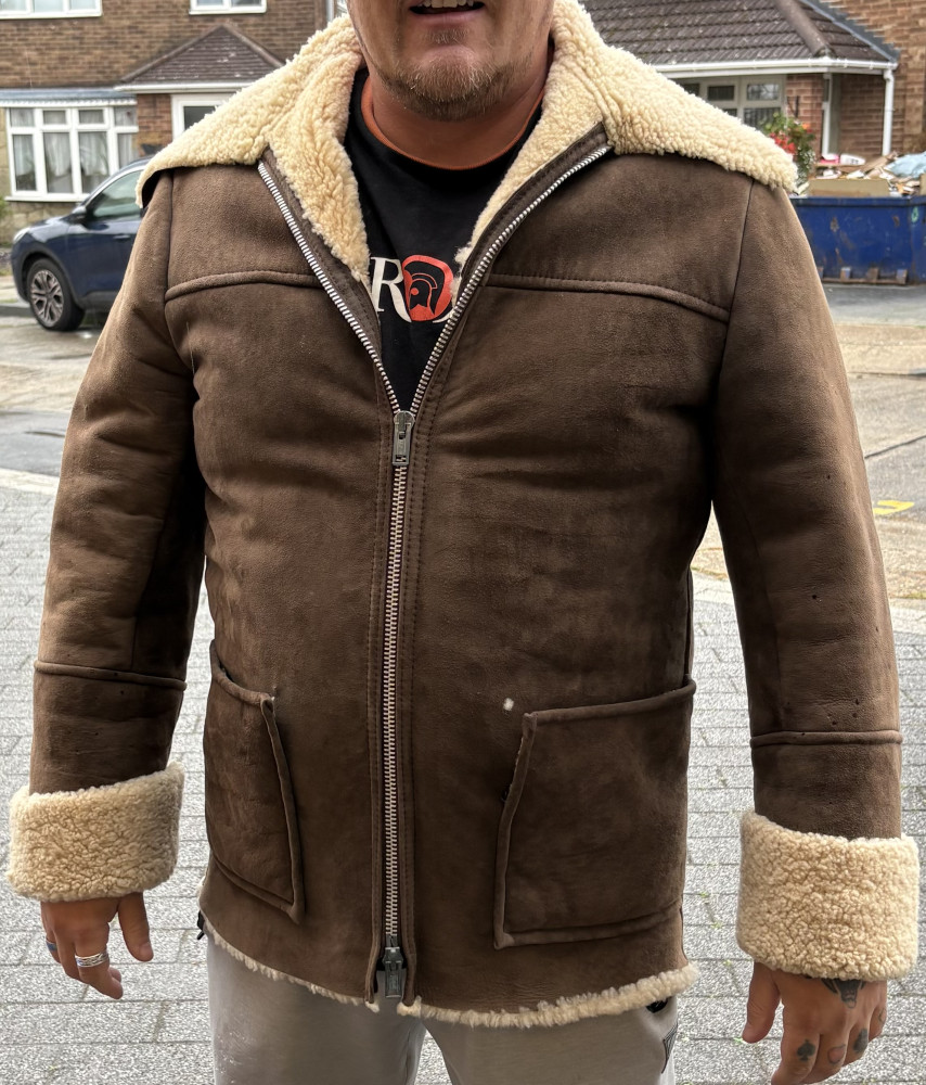 Classic brown sheepskin jacket pockets in need of attention as shown in pictures