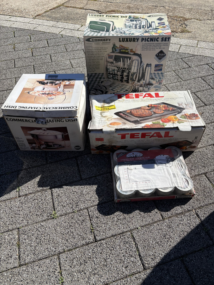 Expensive travel picnic set, table food warmer and commercial chafing dish and box of fuel
