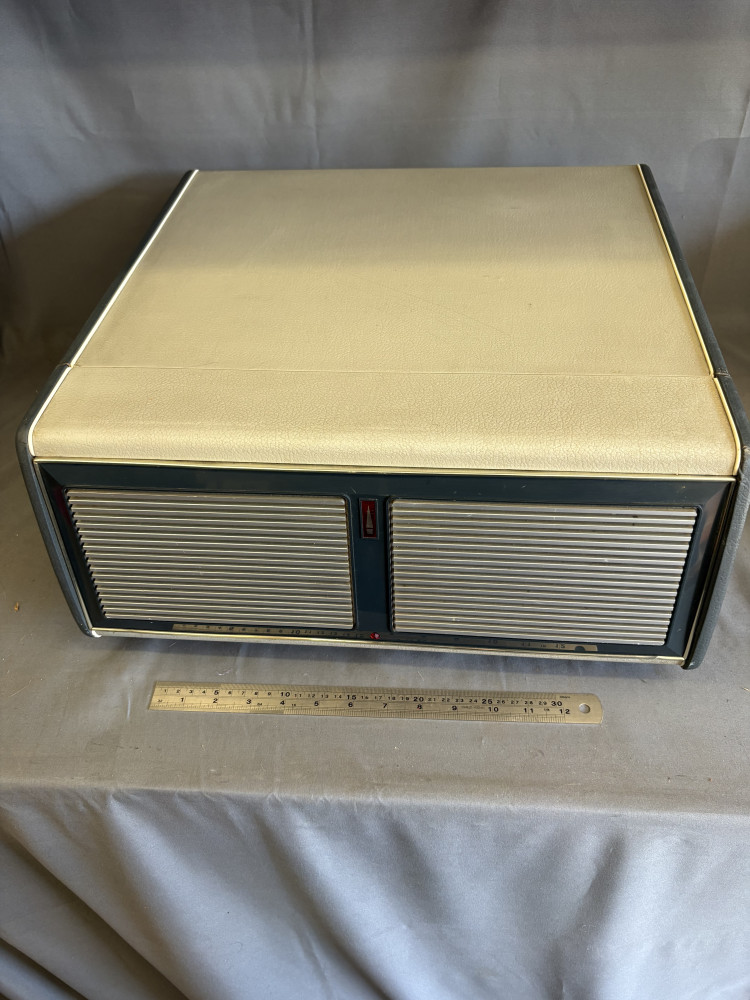 Vintage Bush SRP41 portable record player equipped with a BSR Monarch turntable.