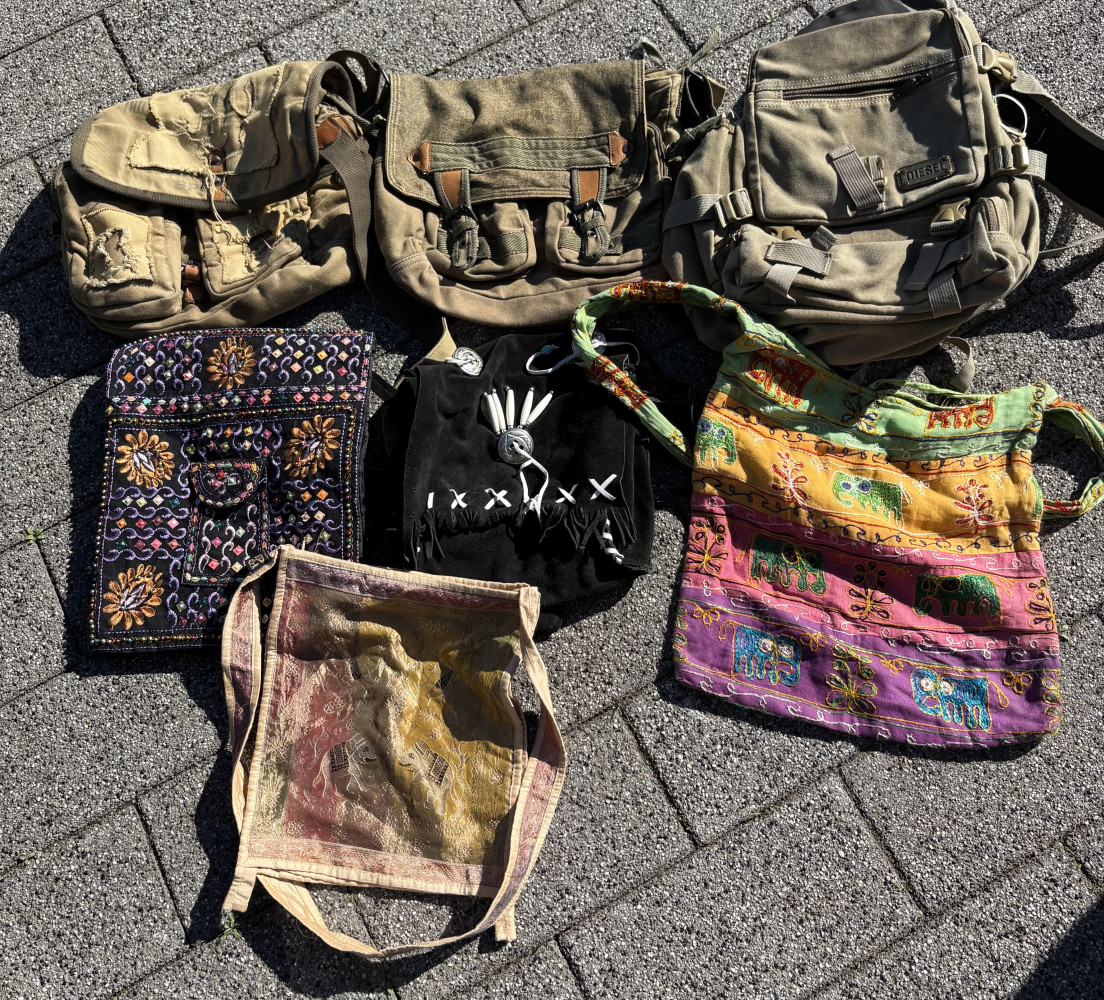 Collection of seven vintage and bohemian-style bags and backpacks