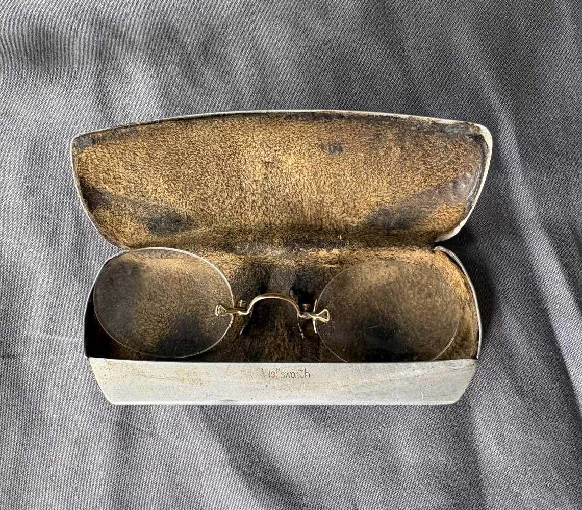 antique rimless pince-nez (pinch-nose) spectacles