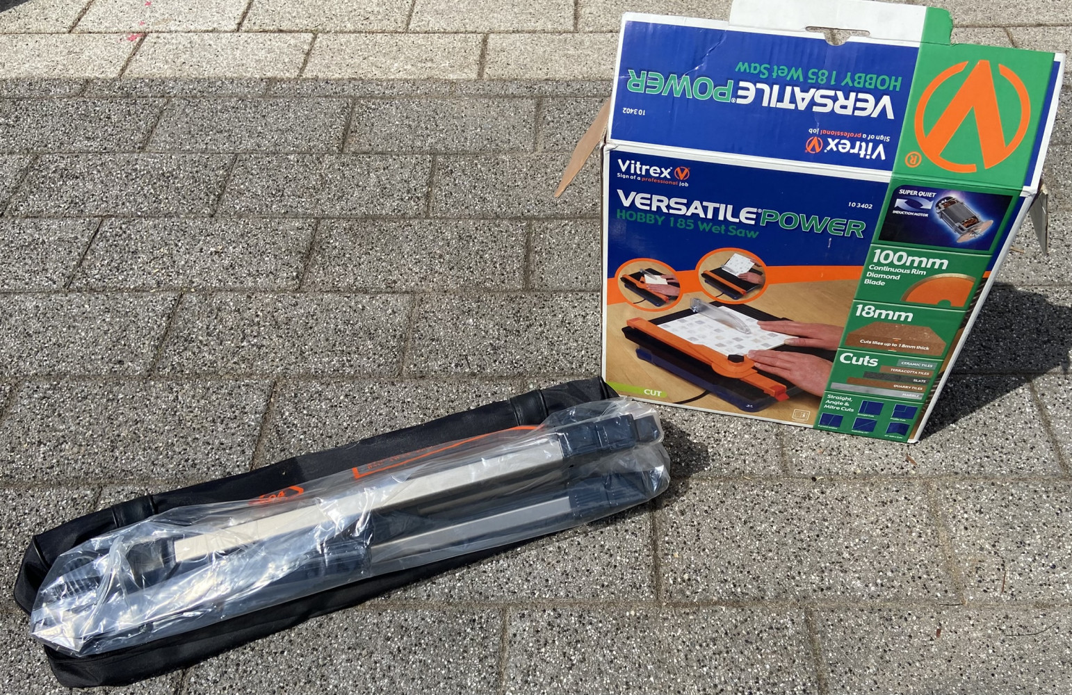 Tripod and tile cutter
