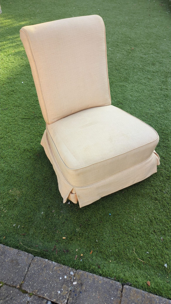 Covered low bedroom chair 