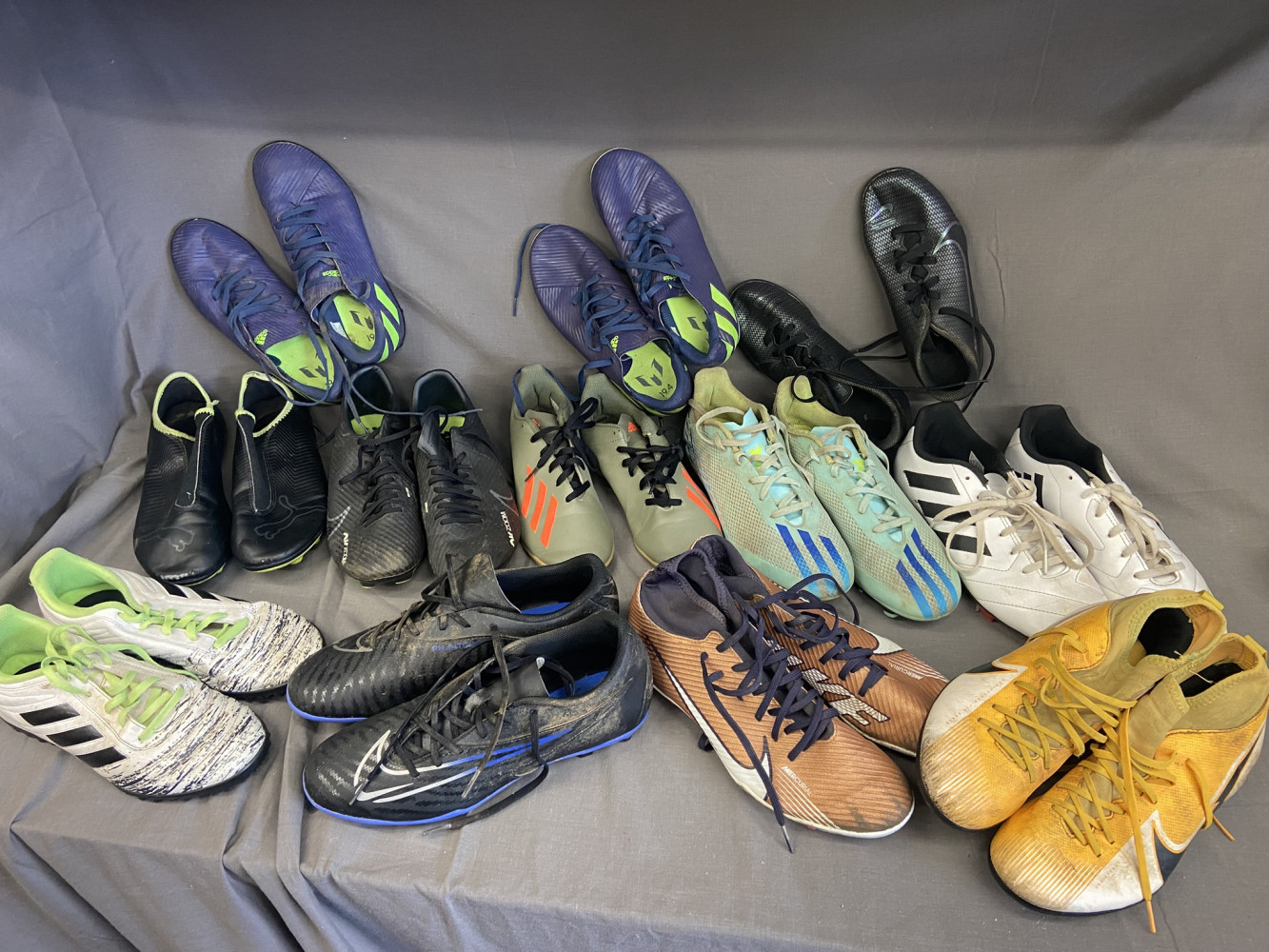 12 pairs of football boots