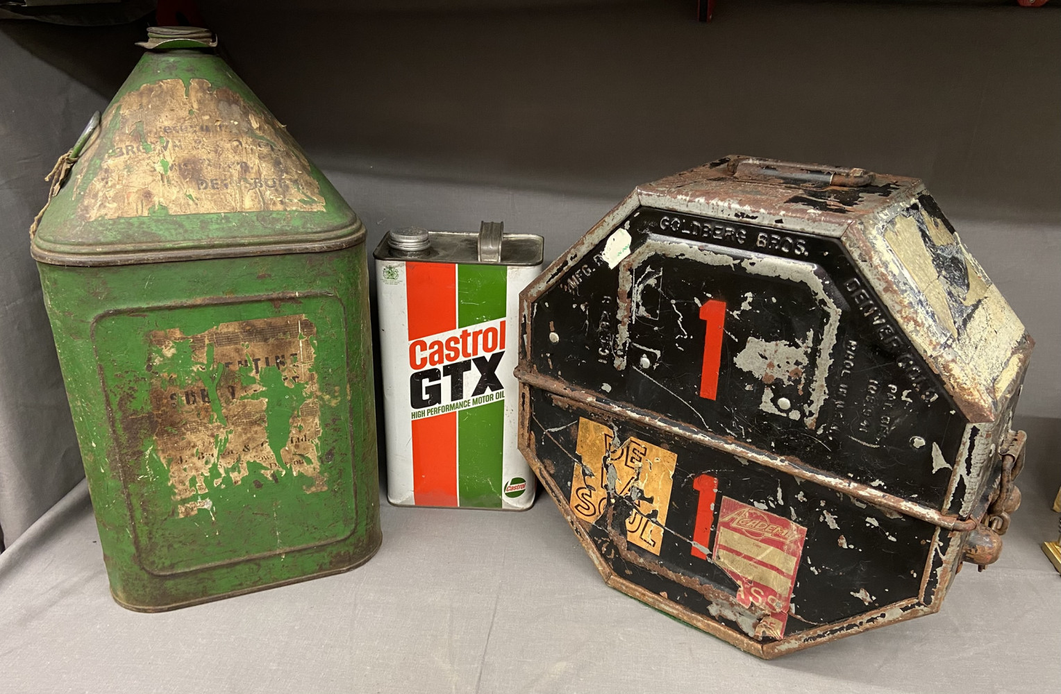 2 Vintage oil cans and Film reel holder case 