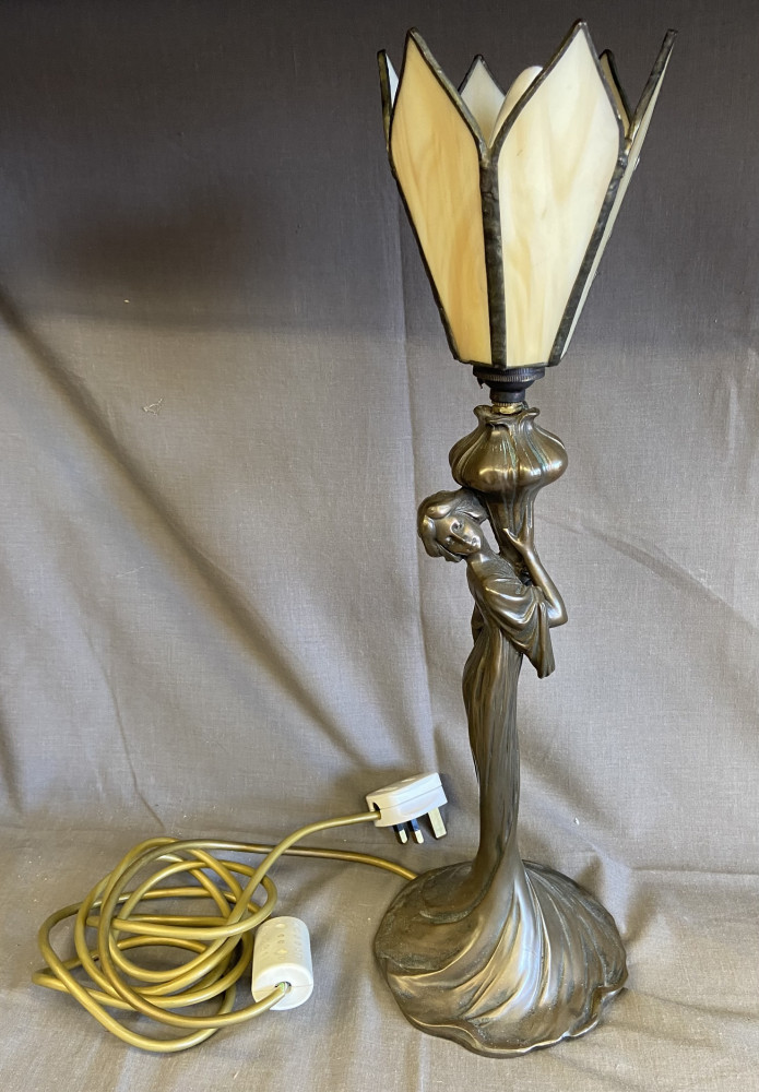 Art Nouveau style bronzed maiden design table lamp with glass shade, 47 cm high